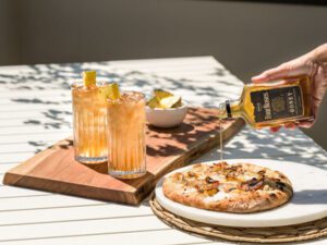 Read more about the article Four Roses Distillery and Ooni Pizza Ovens Release Limited Edition Bourbon Barrel Aged Honey for Summer Entertaining