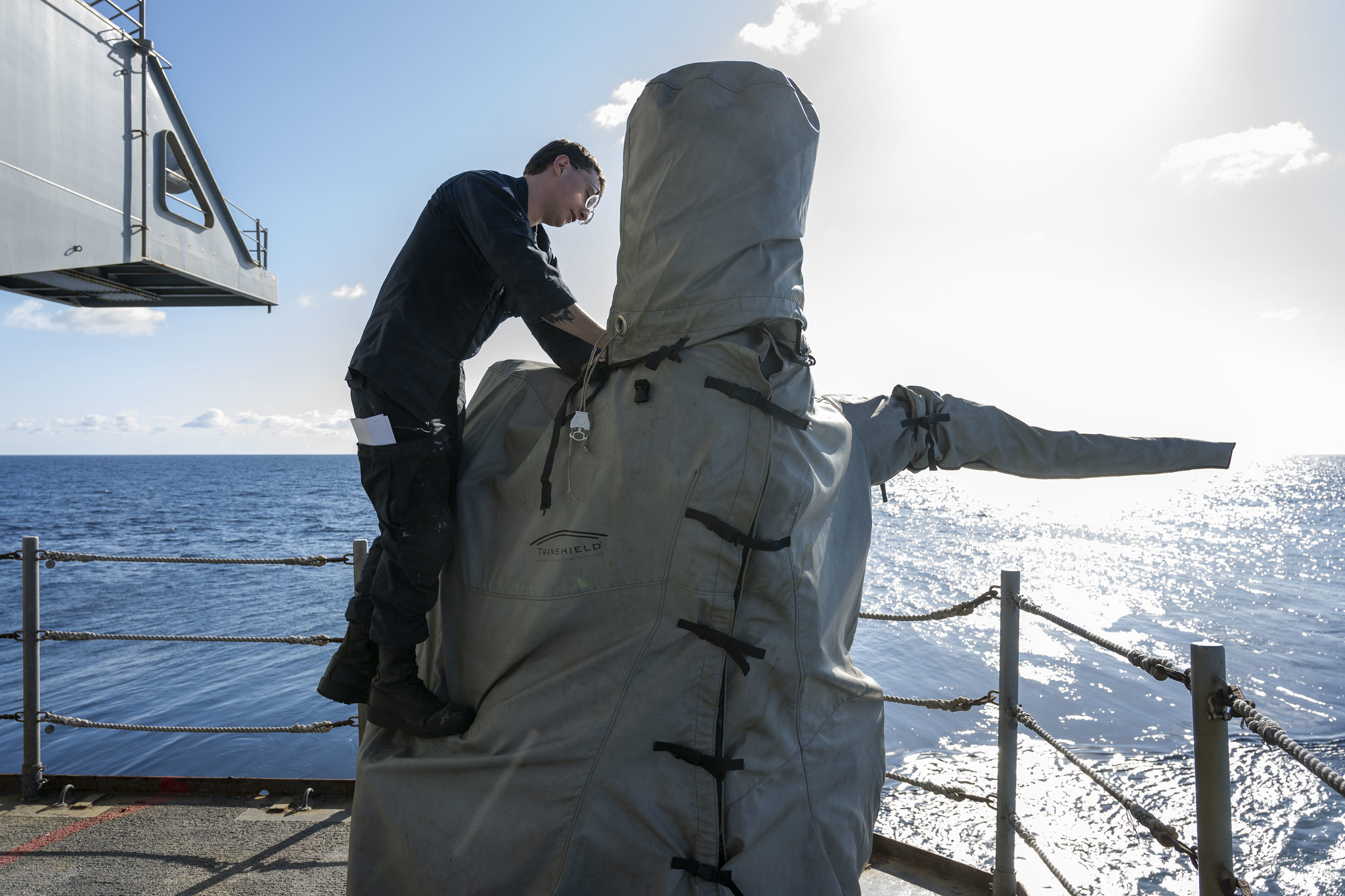 Nimitz Sailor Secures Equipment