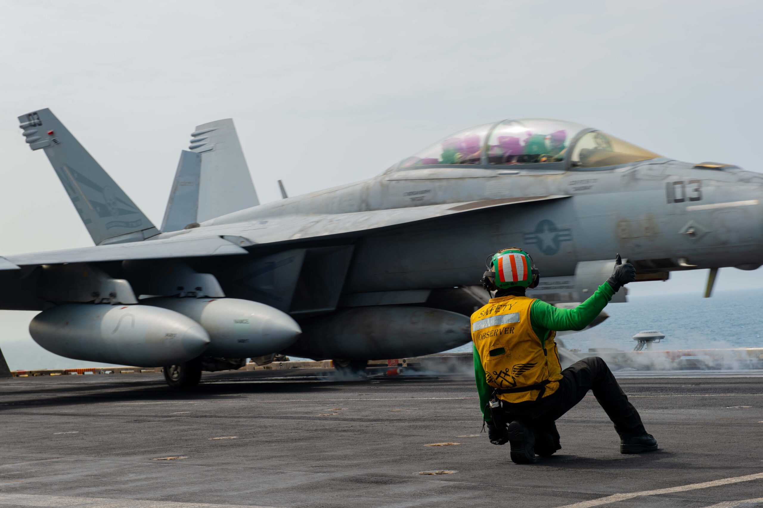 San Antonio native signals an aircraft to launch from the flight deck aboard USS Carl Vinson